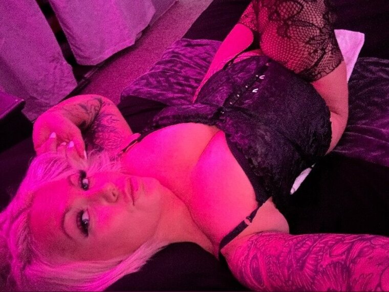 Enigmatic tattooed Viking goddess banner image