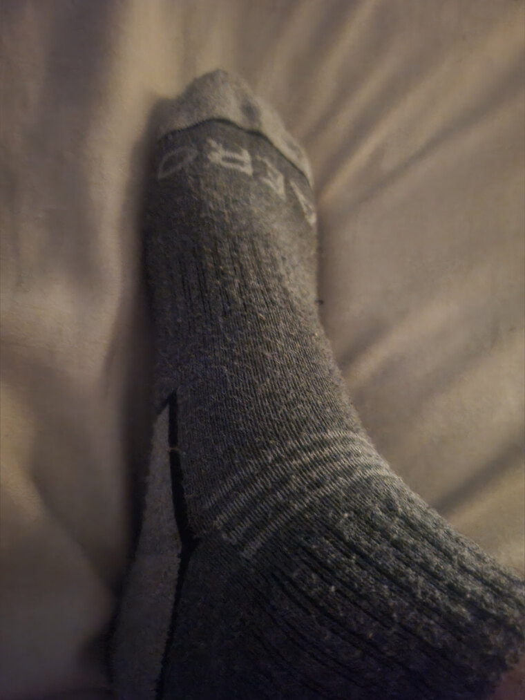 The guy with the feet cover image