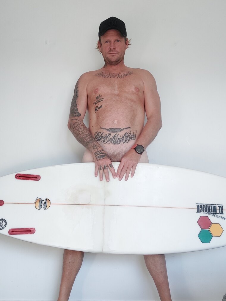 The sun drenched surfer banner image