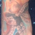 The girl with the octopus tattoo avatar