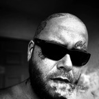 Tattooed and bearded avatar