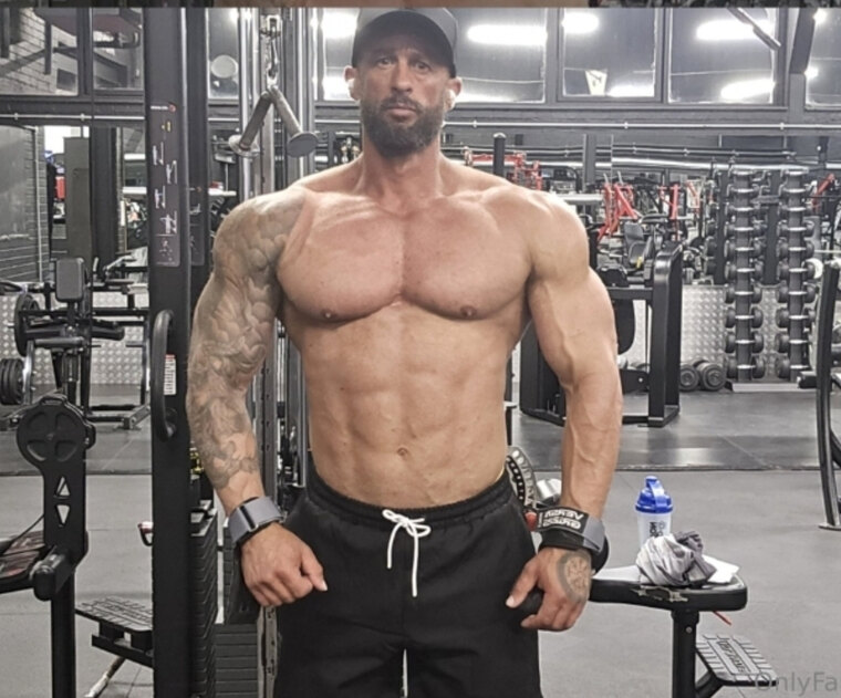 Tattooedandmuscled cover image