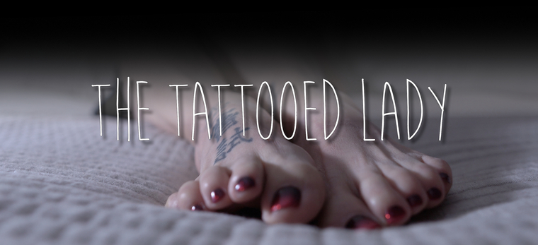 The Tattooed Lady Photos banner image